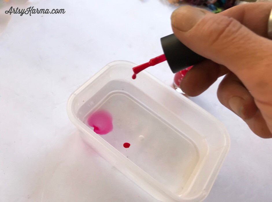add nail polish to water