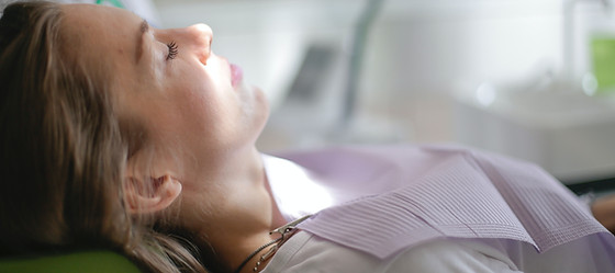 patient-lying-on-dental-chair-in-clinic-