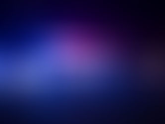 Blurred police lights flashing red, blue, and white on a dark road at night, creating an urgent, tense scene.