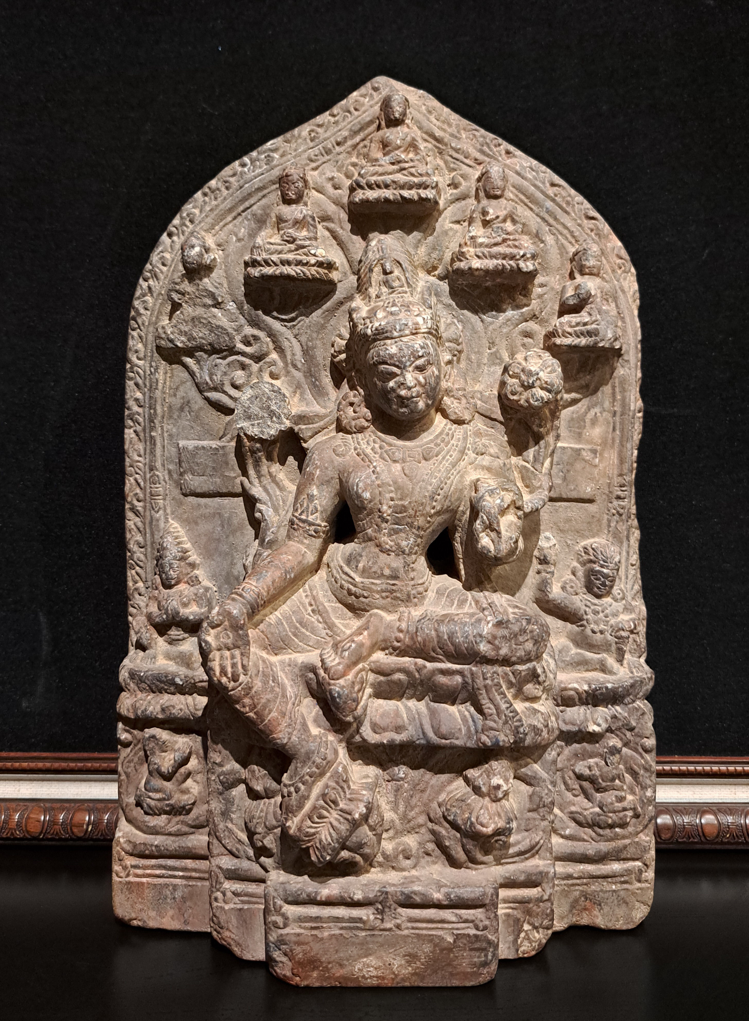 INDIAN BROWNSANDSTONE SEATED FEMALE RELIEF SCULPTURE, 11th CENTURY, PALA PERIOD.