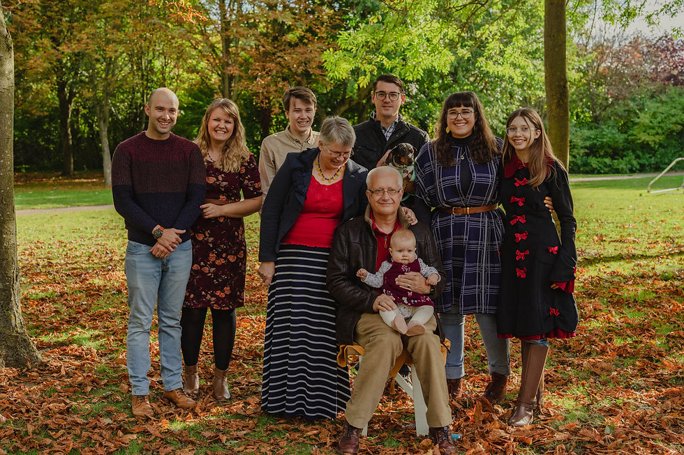 A family portrait at Ferry Meadows, Peterborough, by Motherhood Photographer. Calton Photography