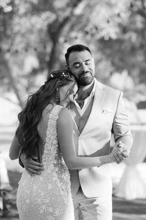 The newlyweds, Laurel and Thomas, sharing an intimate first dance together under the sun at their Zion National Park Wedding celebration.