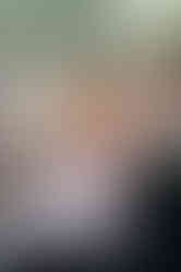 An emotional guest wiping away tears during a moving speech at a Zion National Park wedding reception.