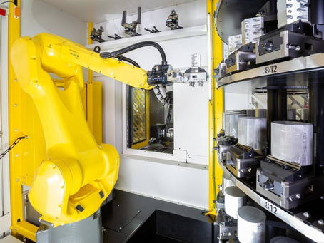 Robotic Arm running a CNC Machine creating efficiencies