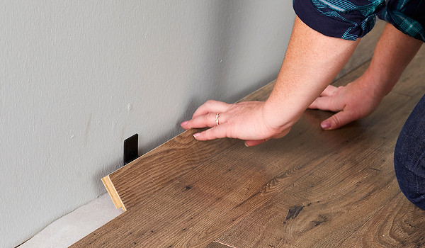 laying-down-new-wood-flooring-79aba8e4.j