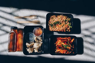 Food in reusable to-go containers.