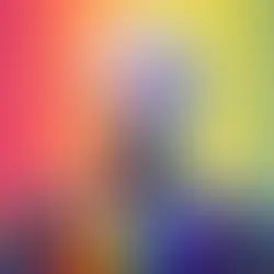 A futuristic humanoid robot with glowing purple eyes stands against a rainbow-colored background. The robot wears a shirt with a rainbow Pride flag pattern, symbolizing LGBTQ+ inclusion in technology and AI. Its metallic hands rest on its chest in a gesture of solidarity.