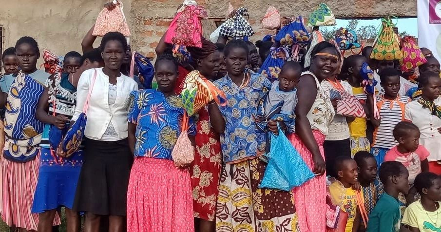A group ofwomen in African who have received their AfriReuse products.