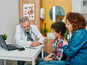 Pediatrician offering emotional support to a young patient