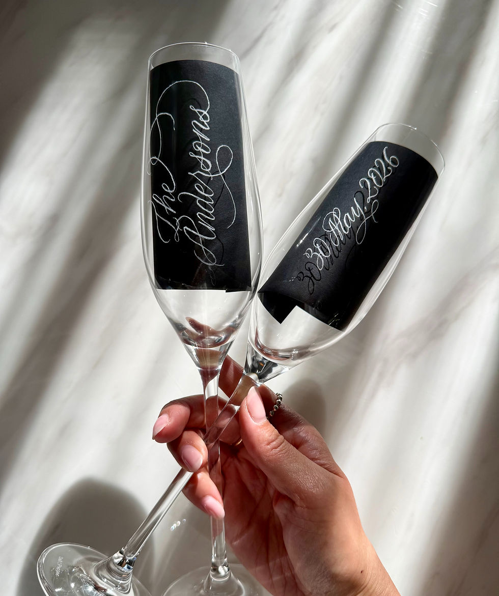 Pair of champagne glasses hand engraved with personalised names