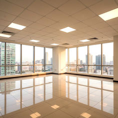 Finished office space for lease at The Exchange Square, Ortigas Center, Pasig City, featuring a spacious corporate floor with ceramic tile flooring, acoustic ceiling with LED lighting fixtures, painted walls, and split-type floor-mounted air-conditioning units. Ideal for BPO companies, corporate headquarters, or professional offices, move-in ready, bright, and modern office environment with excellent accessibility to Ortigas Avenue, SM Megamall, and The Podium.