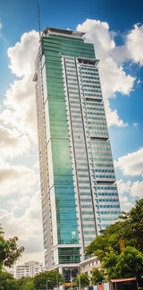 Premium office building One San Miguel Avenue in Ortigas Center Pasig City by Amberland Corporation, offering modern office spaces for rent or sale.