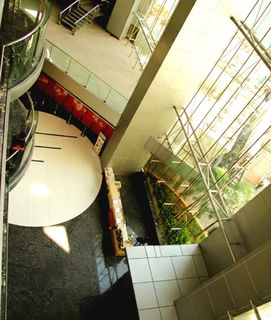 Alt: One Corporate Centre in Ortigas Center, Pasig City – a 54-storey Grade A, PEZA-accredited office tower developed by Amberland Corporation, offering premium office spaces for rent with modern amenities, strategic location, and world-class business facilities along Meralco Avenue.