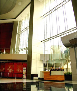 Alt: One Corporate Centre in Ortigas Center, Pasig City – a 54-storey Grade A, PEZA-accredited office tower developed by Amberland Corporation, offering premium office spaces for rent with modern amenities, strategic location, and world-class business facilities along Meralco Avenue.