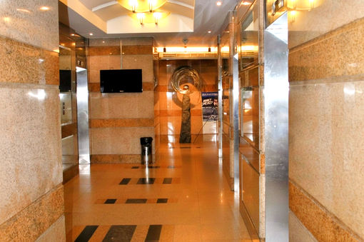 Premium office building One San Miguel Avenue in Ortigas Center Pasig City by Amberland Corporation, offering modern office spaces for rent or sale.