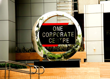 Alt: One Corporate Centre in Ortigas Center, Pasig City – a 54-storey Grade A, PEZA-accredited office tower developed by Amberland Corporation, offering premium office spaces for rent with modern amenities, strategic location, and world-class business facilities along Meralco Avenue.