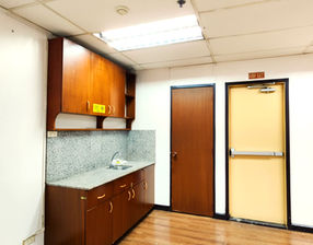 Strata 100 Ortigas Center office spaces for lease, modern commercial building with clean interiors, flexible office layouts ideal for SMEs and corporate back-offices, conveniently located near SM Megamall and Shangri-La Plaza in Pasig City, accessible via major roads and public transport.