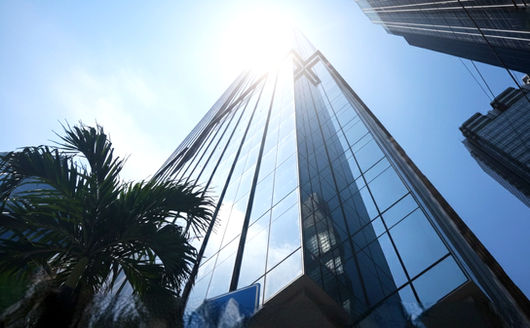 Corporate Finance Plaza Ortigas Center Grade-A office building with modern architecture, high-speed elevators, 100% backup power, podium gardens, flexible office layouts, prime commercial location in Metro Manila, ideal for corporate offices and business headquarters.
