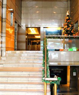 Premium office building One San Miguel Avenue in Ortigas Center Pasig City by Amberland Corporation, offering modern office spaces for rent or sale.