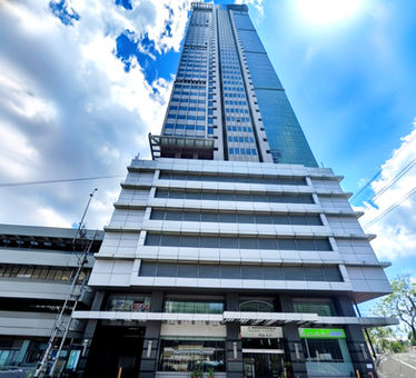 Premium office building One San Miguel Avenue in Ortigas Center Pasig City by Amberland Corporation, offering modern office spaces for rent or sale.