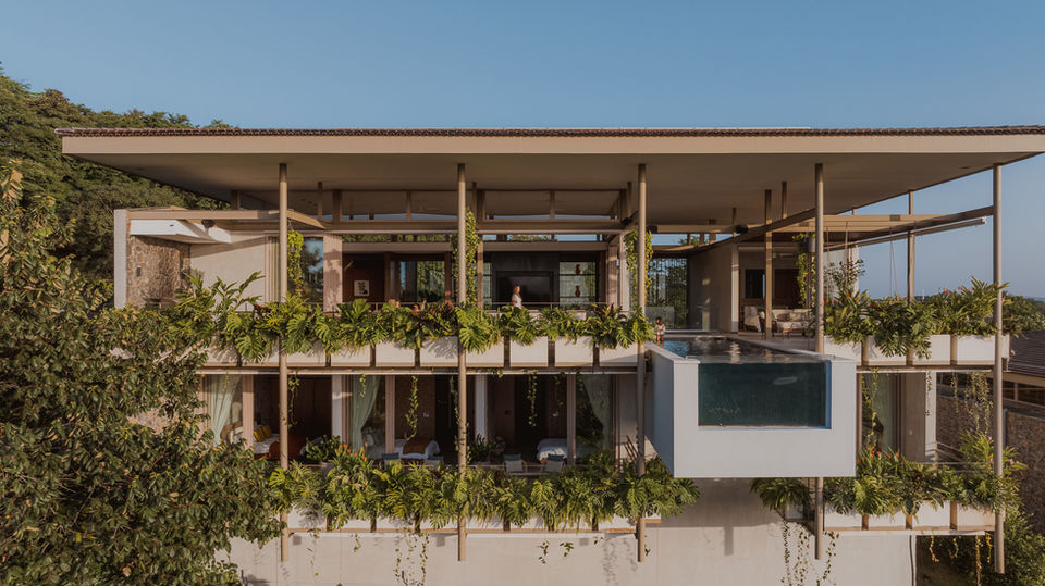 Villa Nuri by Studio Saxe in Costa Rica photographed by architectural photographer Alvaro Fonseca showcasing tropical architecture integrated with nature