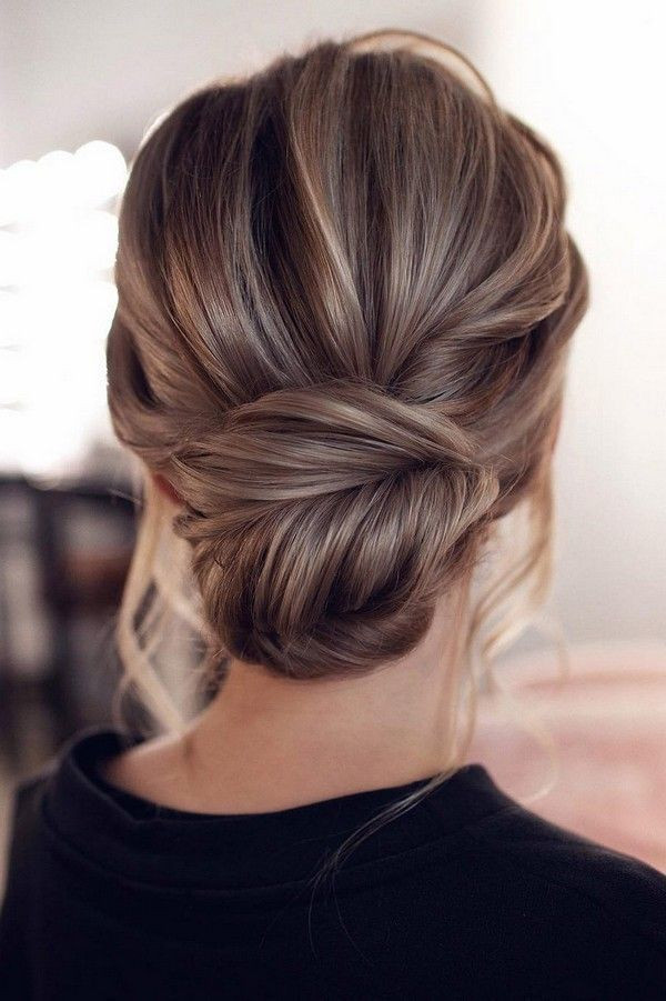 low chignon bun for weddings and brides