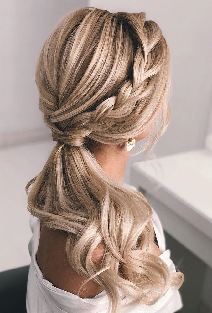 Low pony and curls hairstyle for weddings
