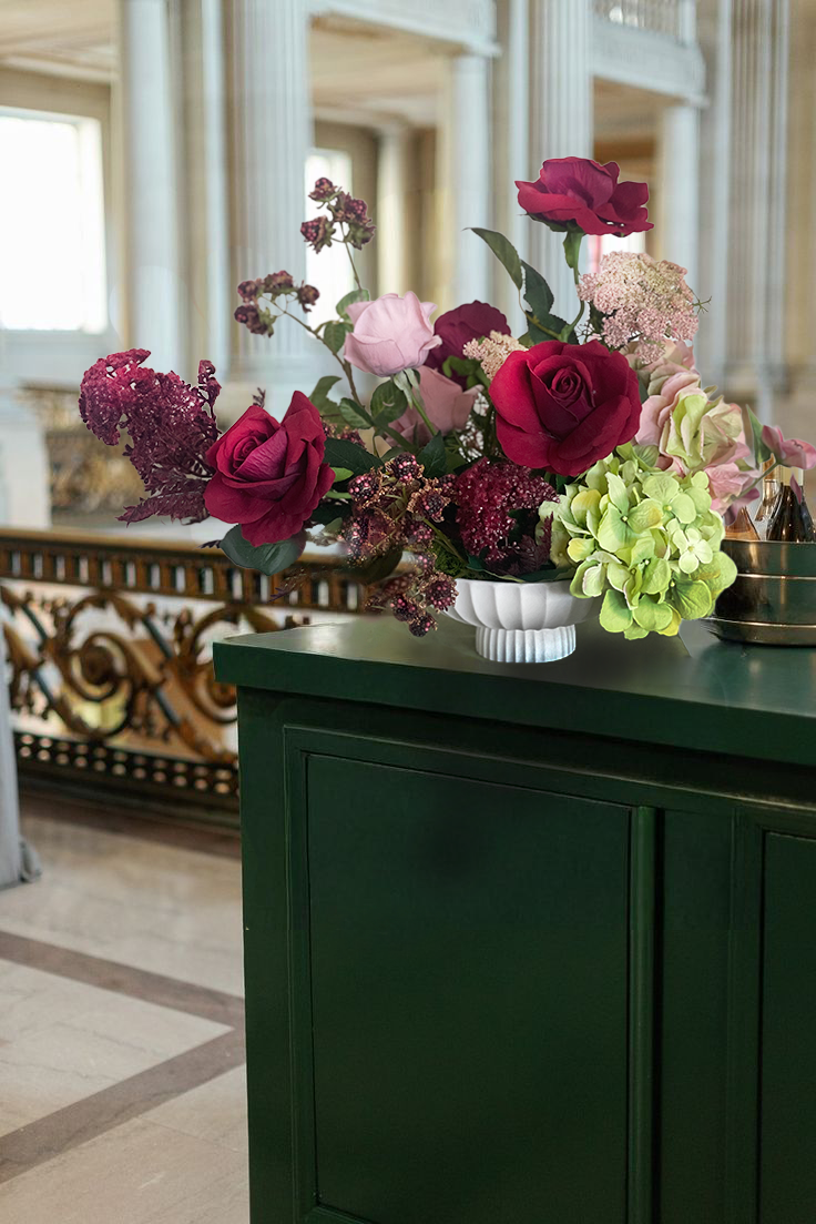 blushing compote arrangement featuring luxurious artificial flowers in wine, blush pink and lime green colours