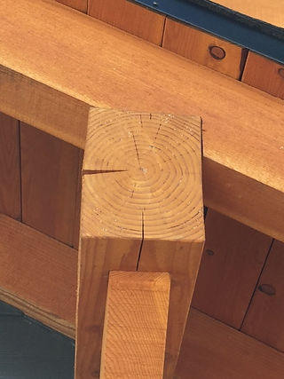  and example of what cracking in a timber frame looks like.