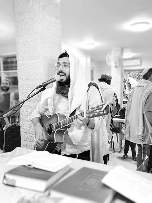 Rav Yonatan Attias singing - leading Hallel at Pnima Jerusalem