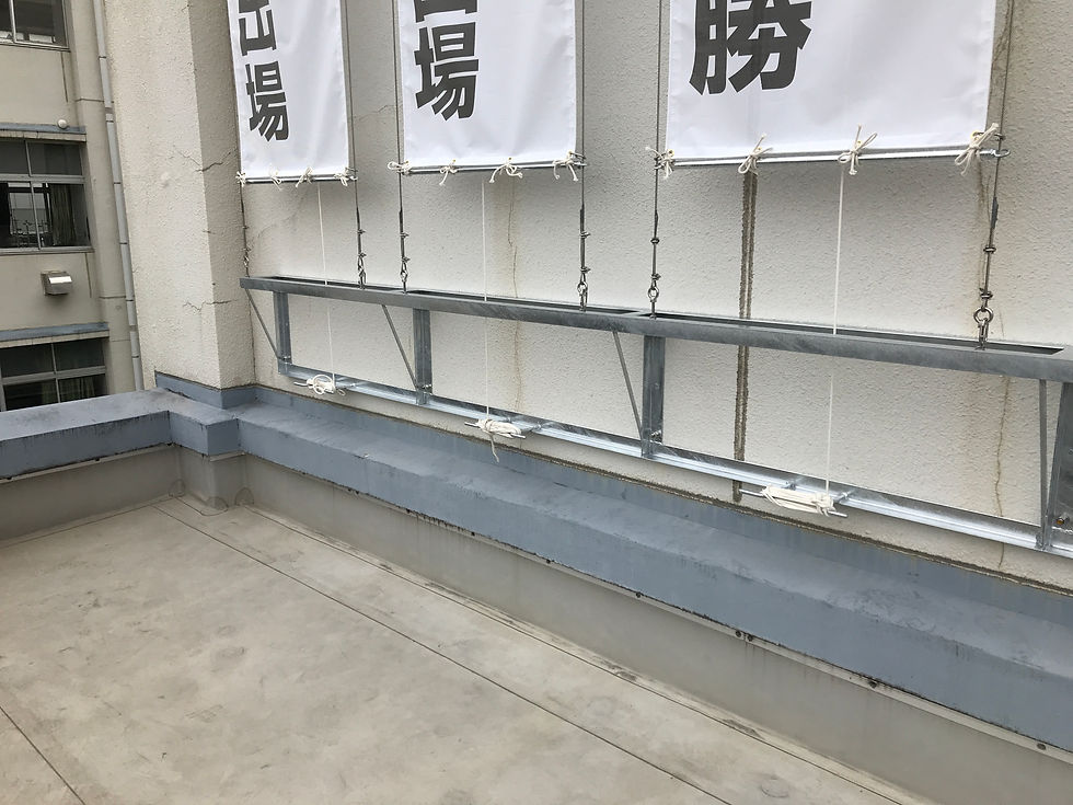 懸垂幕昇降装置