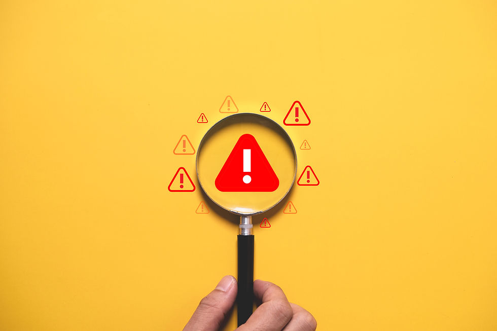 Alert image with warning sign and magnifying glass