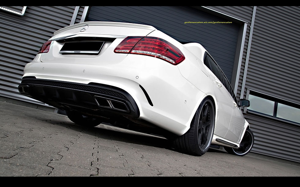 2013-Wheelsandmore-Mercedes-Benz-E63-AMG-Seven-11-Rear-Angle.jpg