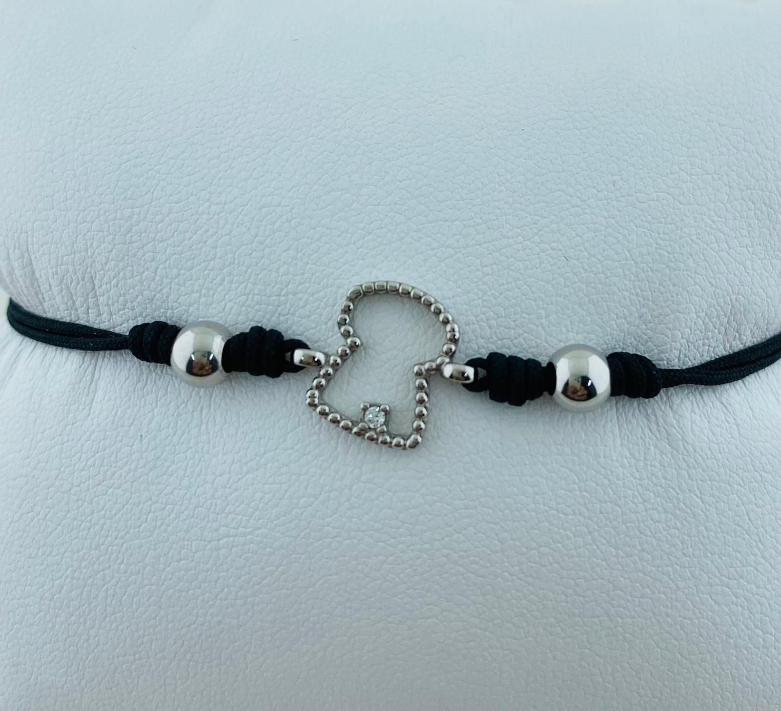 Polsera plata de fil amb tap de cava petit