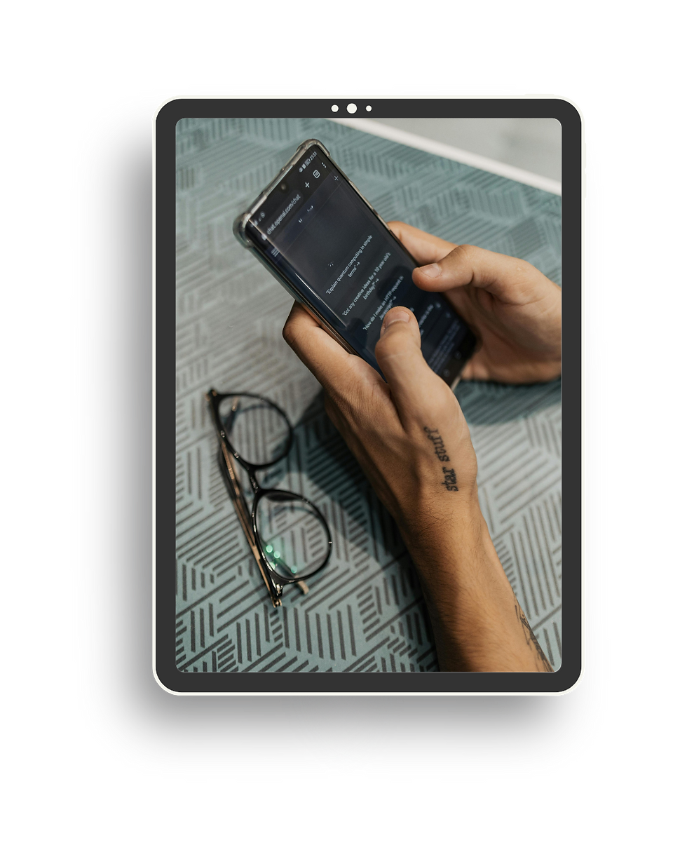 Tablet with Hands holding phone.png