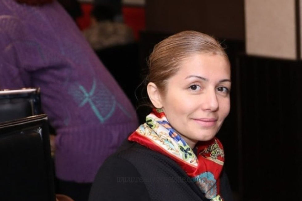 Hapisteki Azerbaycanlı siyasi analist Azer Gasimli'nin eşi, resmi olarak hakaretle suçlandıktan sonra altı aya kadar hapis cezasıyla karşı karşıya bulunuyor.
