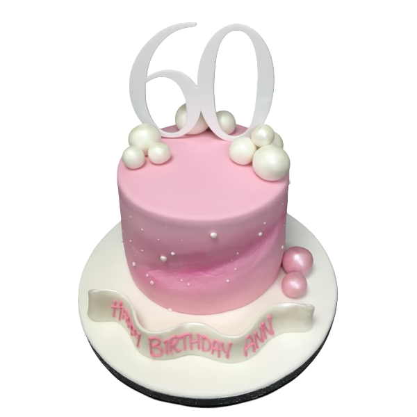 A stunning cake with a textured surface embellished with shiny pearls in a beautiful arrangement. A unique and elegant dessert for special occasions.