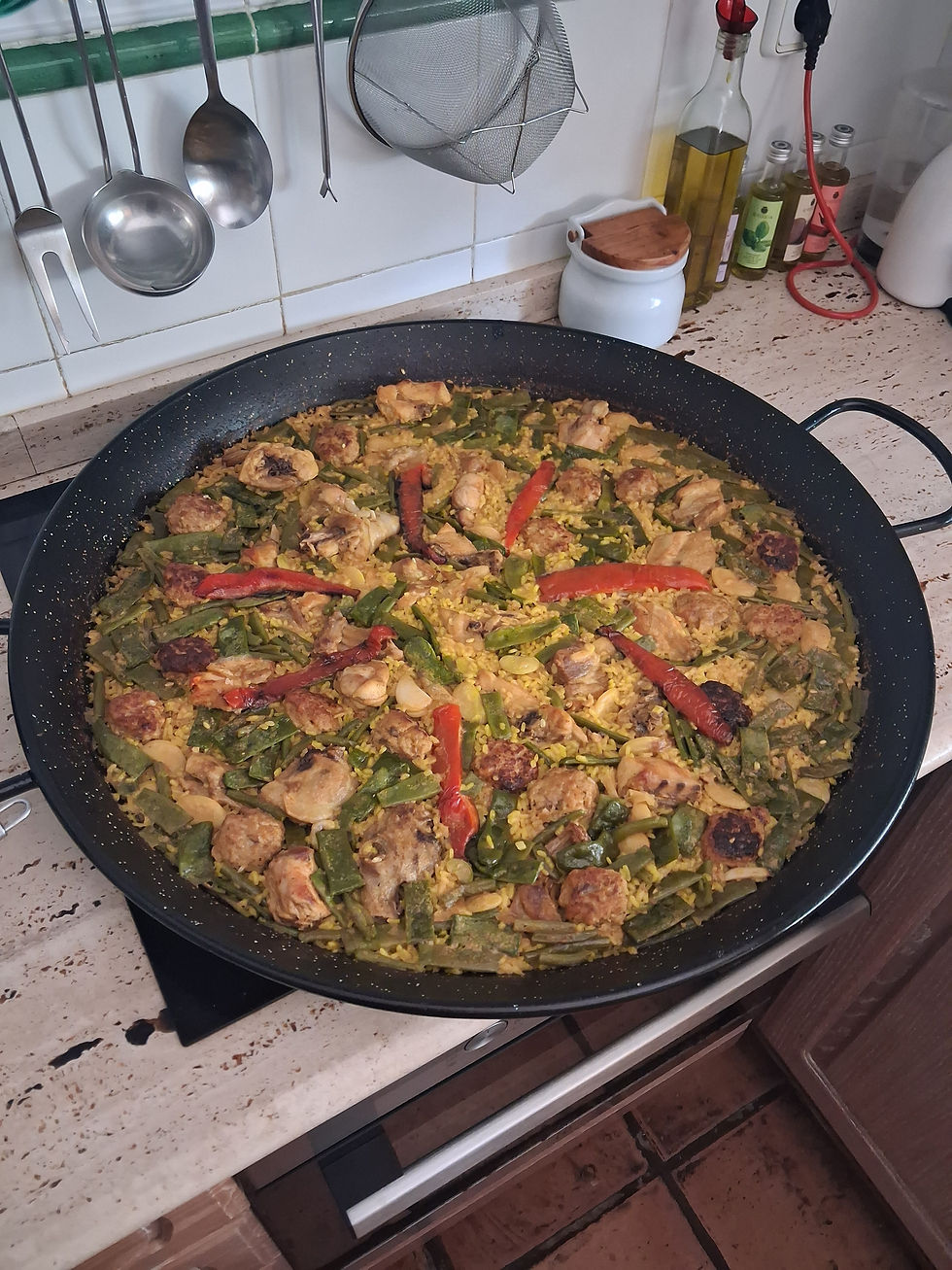 Paella valenciana hecha por Sira, la madre de Sira. Daimús, 11/07/2026