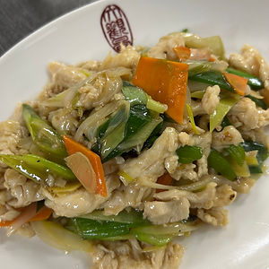 Poulet mit Frühlingszwiebeln und Ingwer