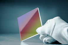anti-reflective glass with an optical in
