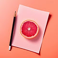 White piece of paper with a picture of a grapefruit on it.jpg