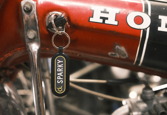Sparky Tester hanging off egnition of Honda ct70