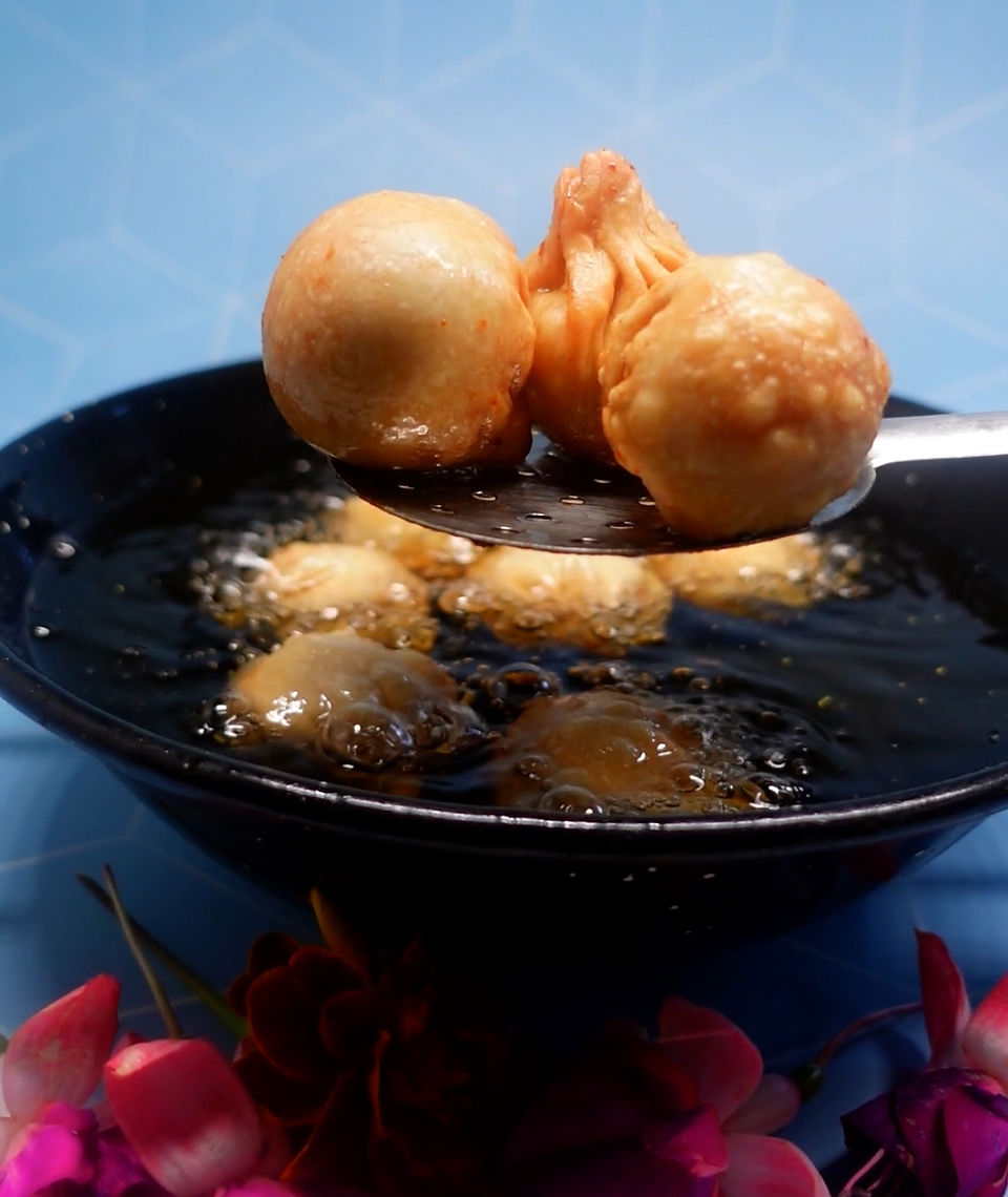 Frying modaks maharashtra mithai