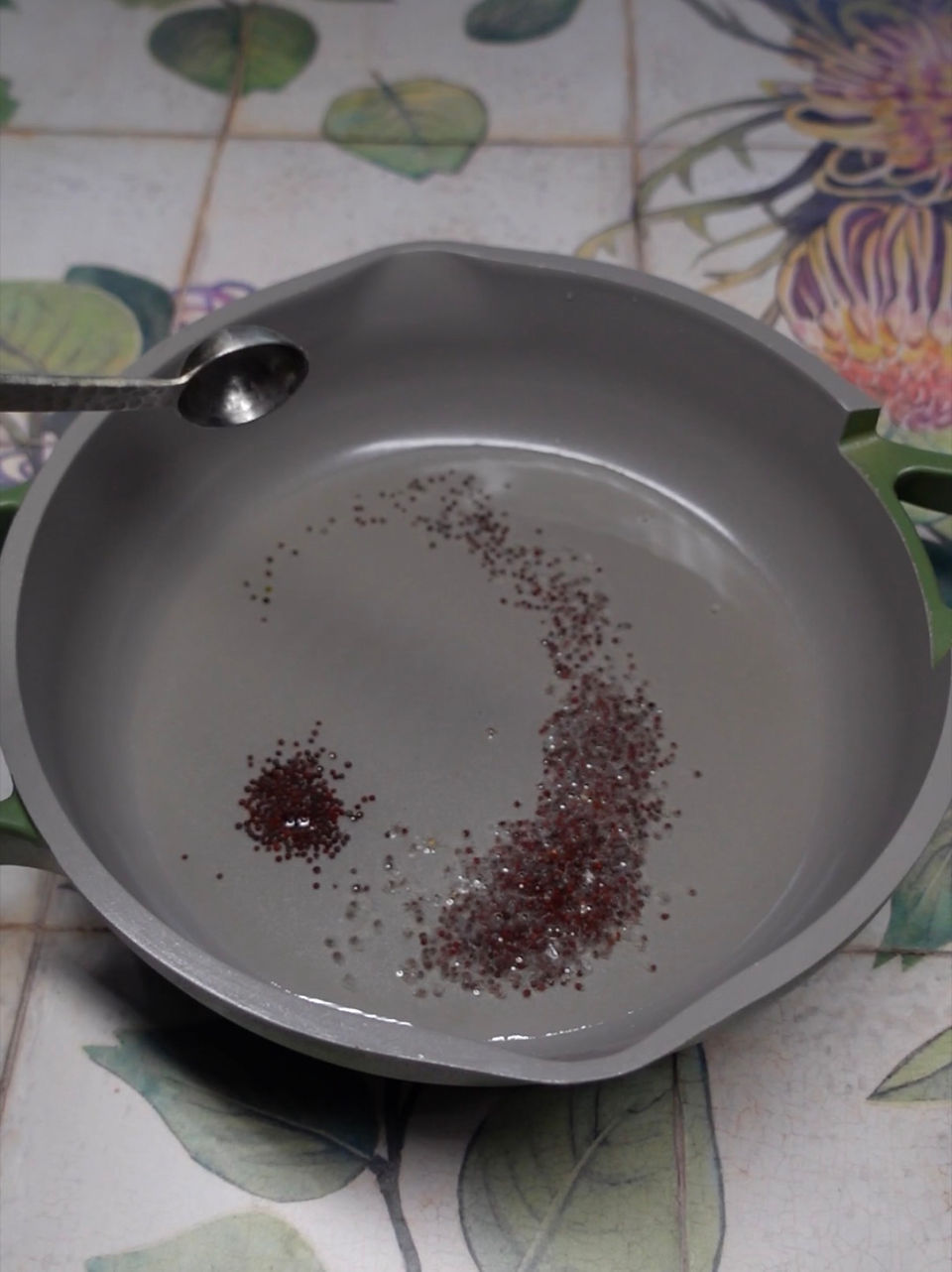 adding mustards seeds for a vaghar for tameta nu shaak