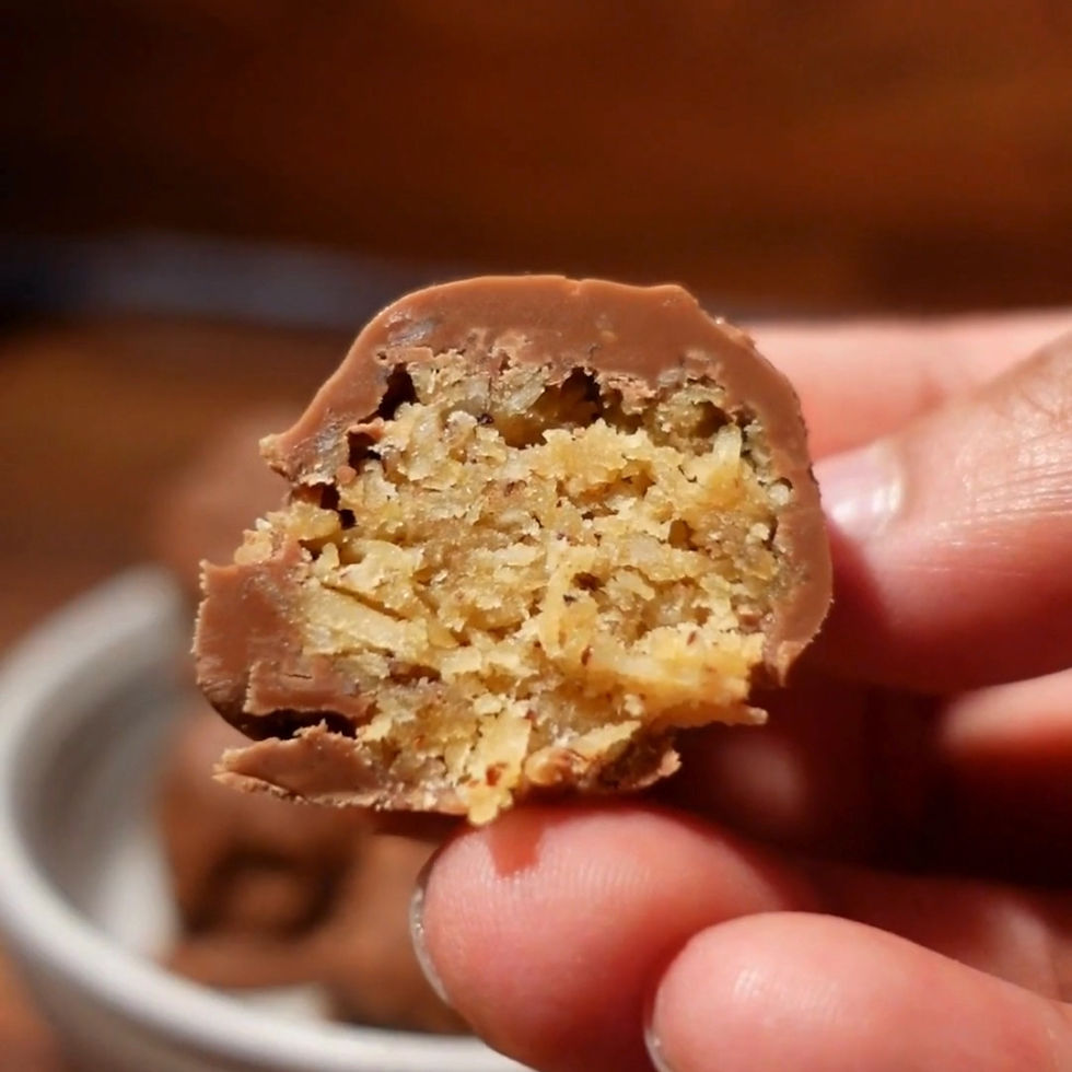 Chocolate coated modak saran balls coconut and jaggery mithai recipe Ganesh Chaturthi
