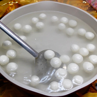 boiling rasmalai in sugar syrup