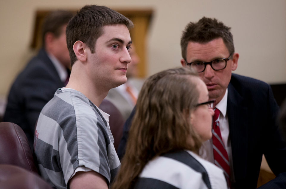 Travis and Sarah Mitchell appear in court.