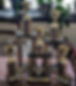 Several trophies on a table. Gold cups and black bases are visible.