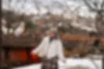 girl standing in front of the bridge