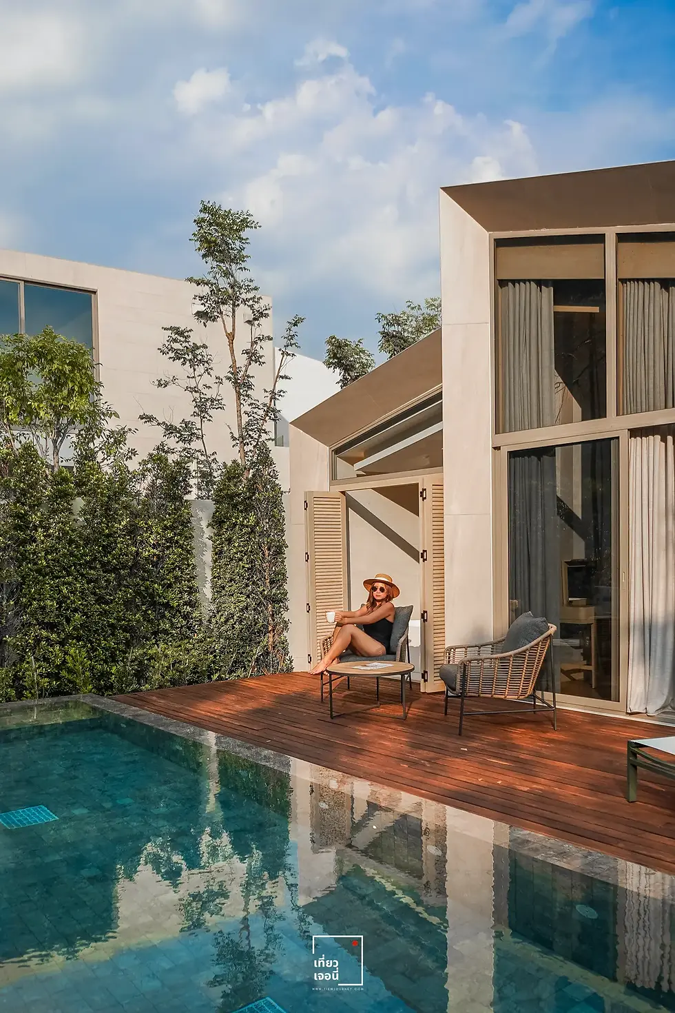 girl sitting beside pool in room hotel mys khaoyai